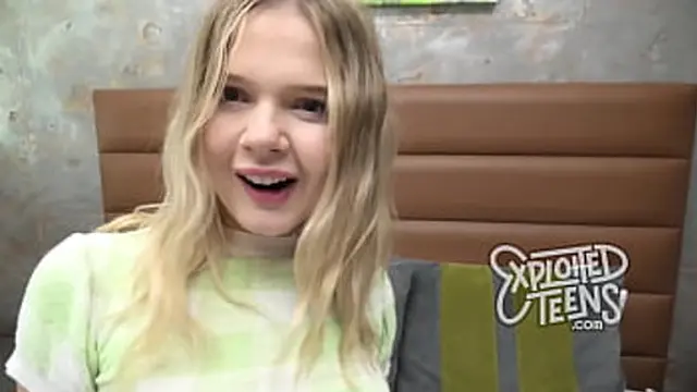 Blonde teen takes center stage in explicit porn scene